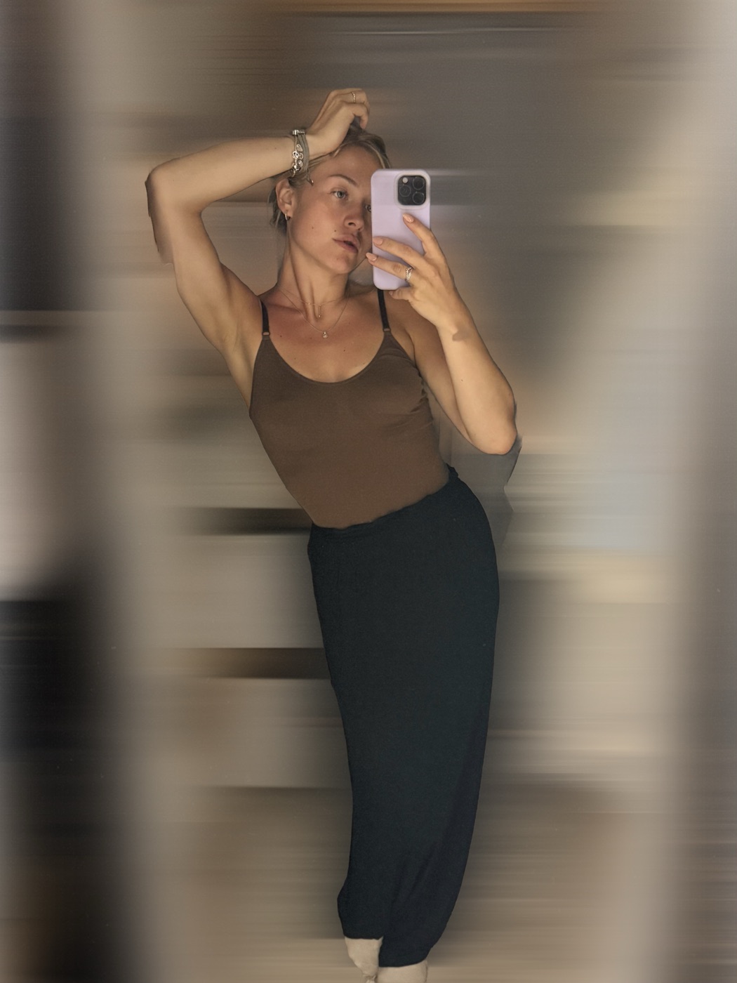 Brown camisole with a dark maxi skirt