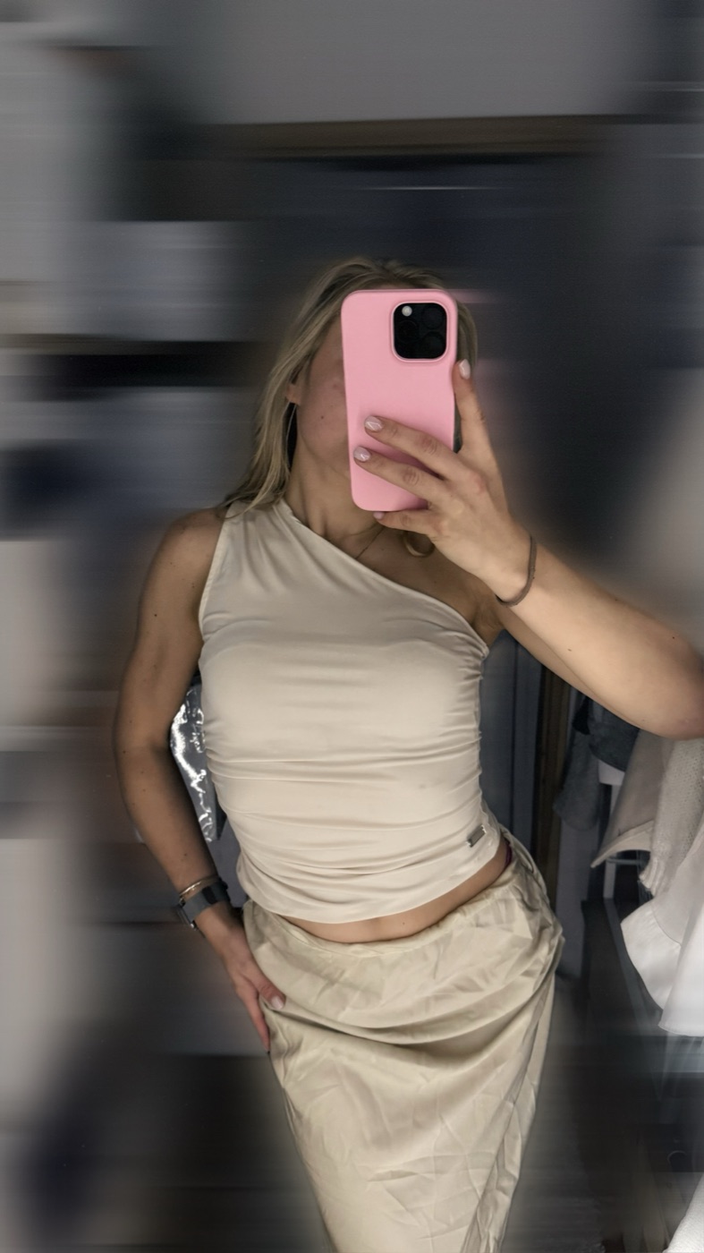 Cream one-shoulder top and skirt, second look
