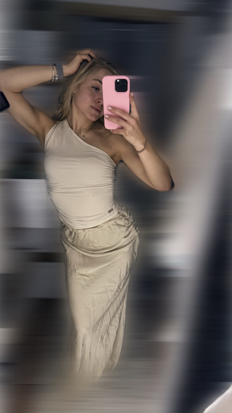 Cream one-shoulder top with a matching long skirt
